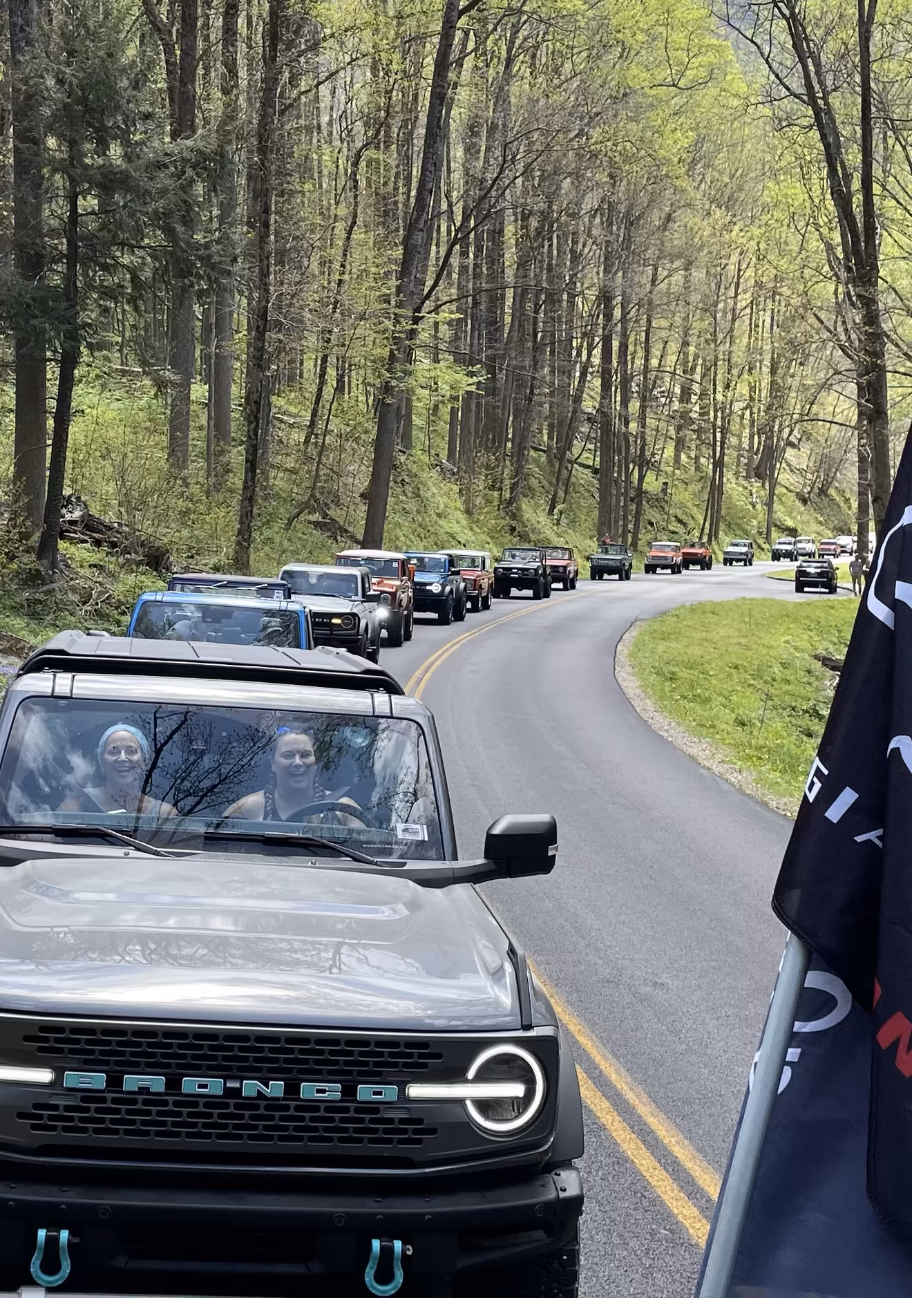 Georgia Broncos meetup — people and trucks gathered together